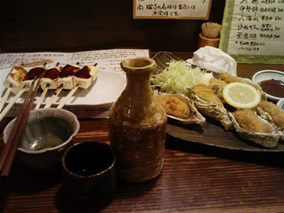 豆腐と牡蠣フライ 更に燗の日本酒